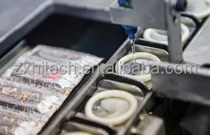 Cadena de producción ultra fina del condón del sabor de la fruta ayuda en línea
